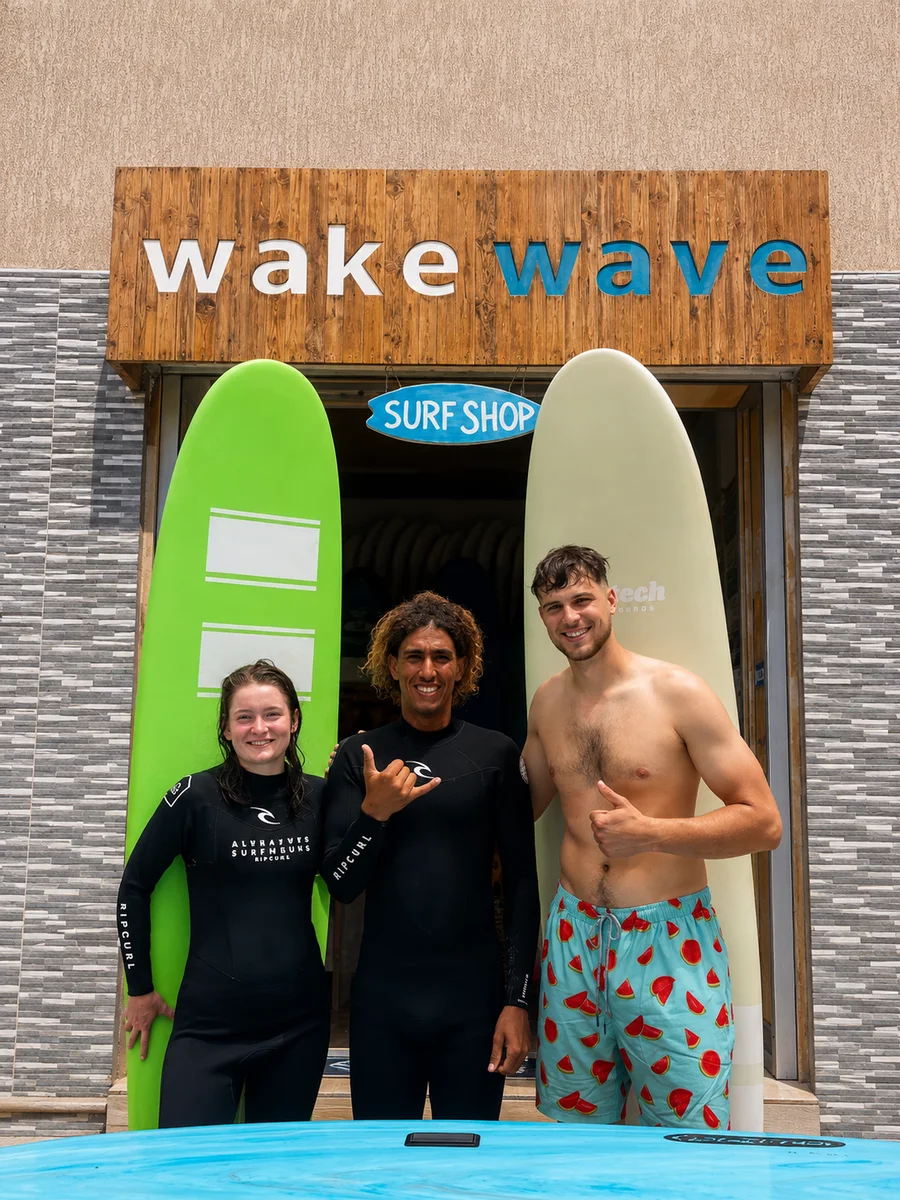 Wake Wave surfboards displayed at the shop door in Anza.